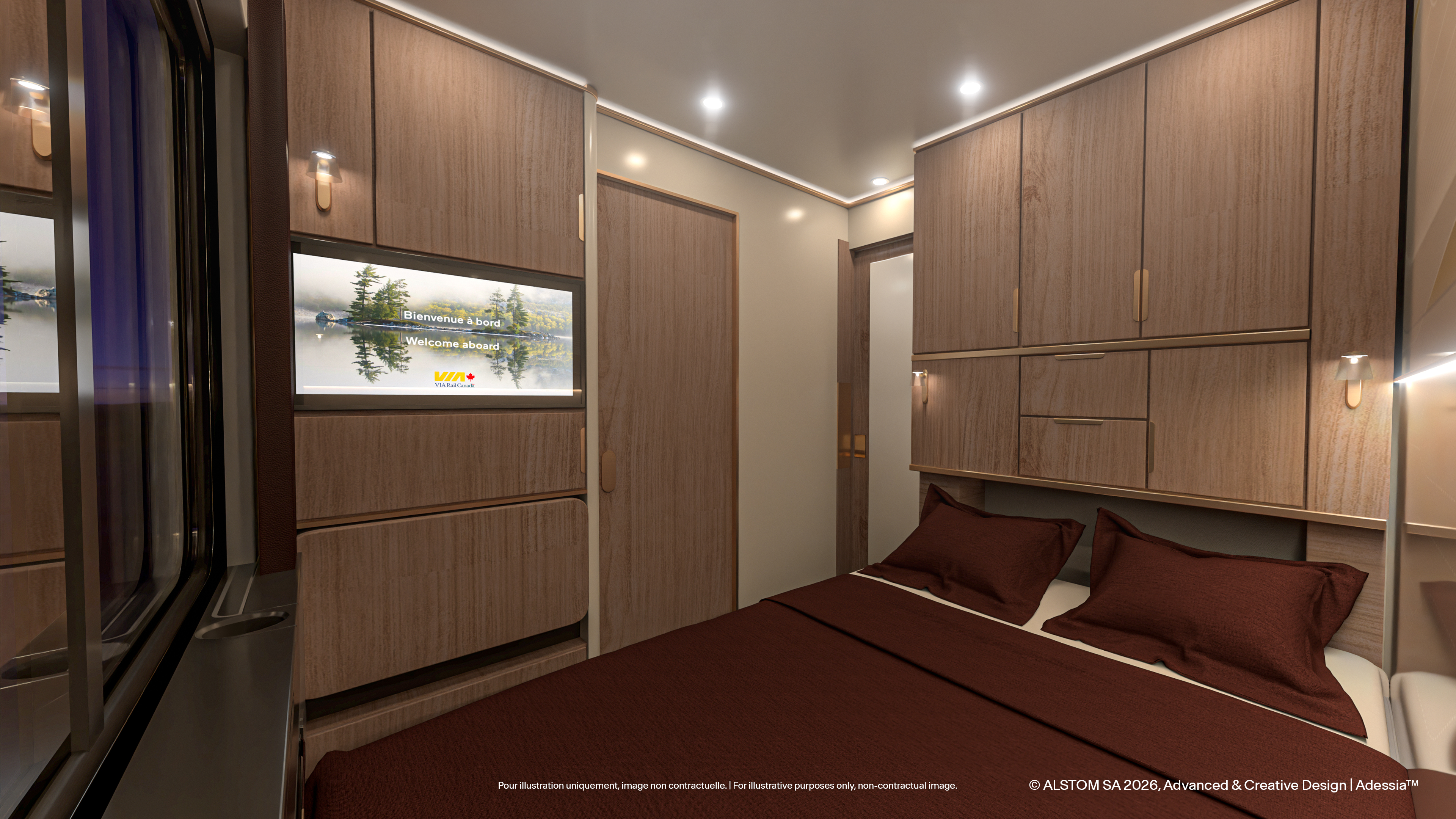 Cabin interior at dusk with the lights up, showing the skylight above the berth